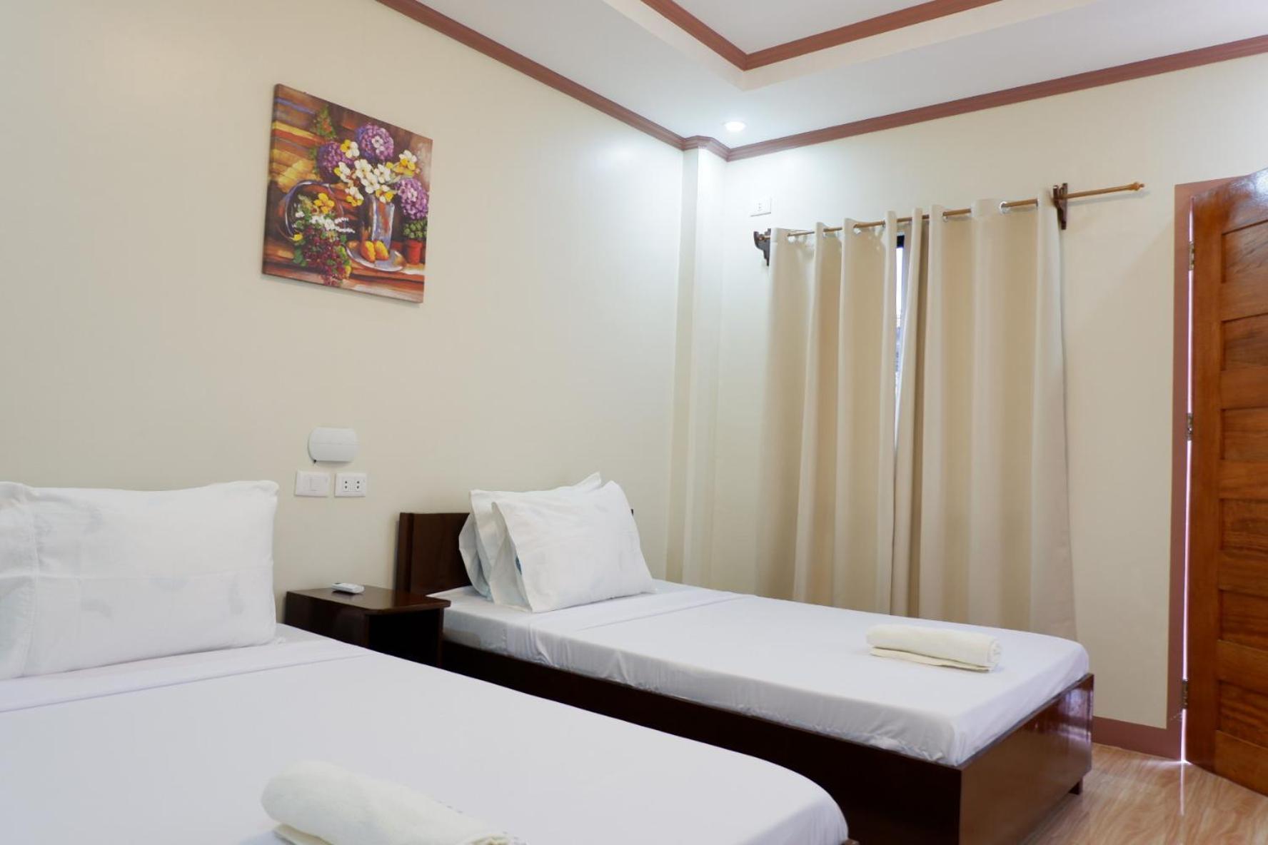 Jun'S Inn Oslob Buitenkant foto